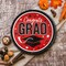 25 Count Red Graduation Supplies 9 Inch Round Plates with Congrats Grad Design